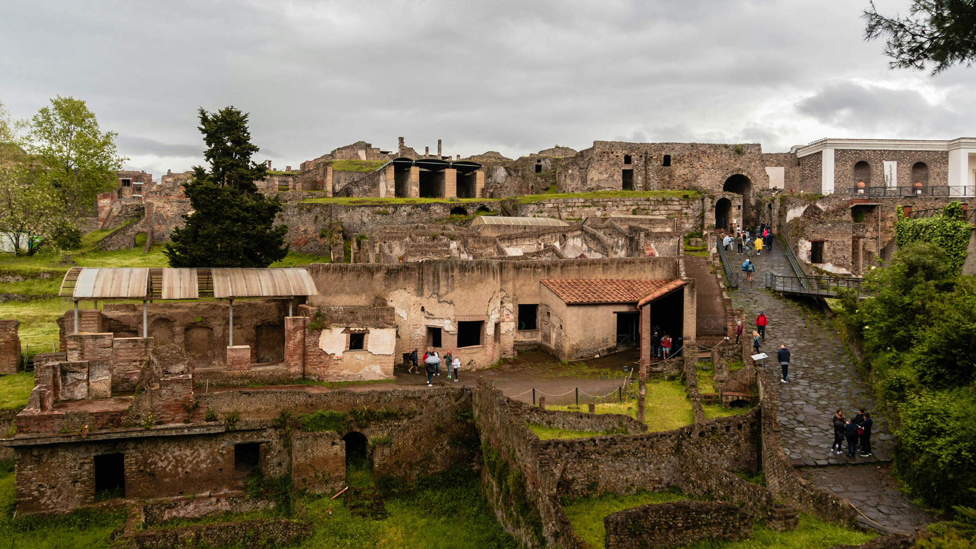 Pompeii Ruins Preservation: Tourists exploring ancient streets amidst conservation efforts